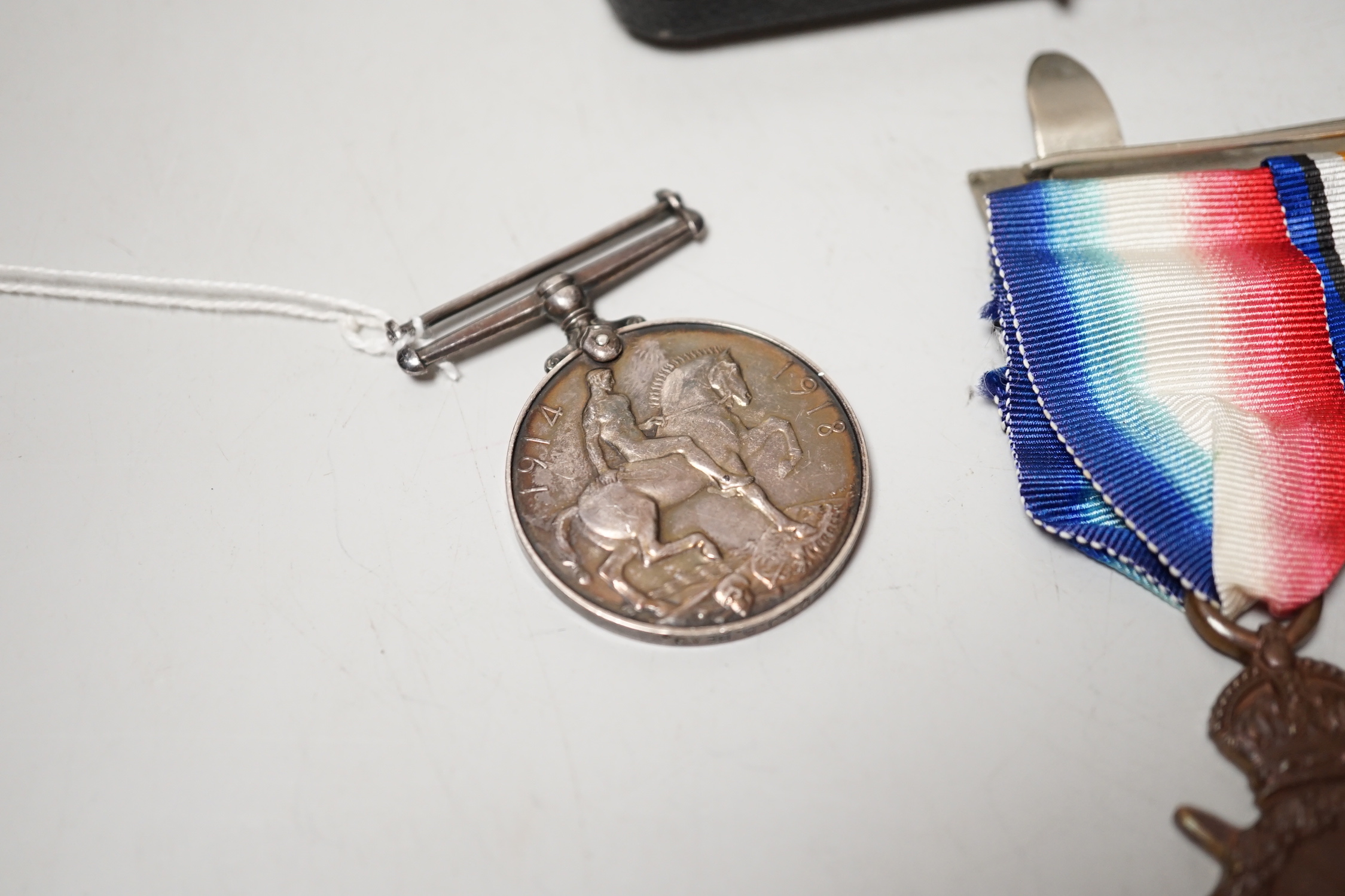 A World War I/World War II group of four Medals to M2–101459 PTE. J. Bourne. A.S.C., A war medal two second lieutenant J D Head and An Opening of the Cenotaph large silver medal, 75 mm